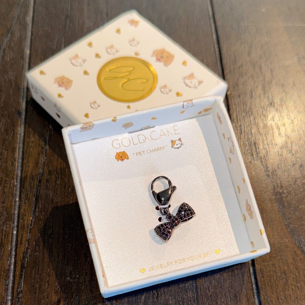 Gold Cake Pet Charm with Black Bow